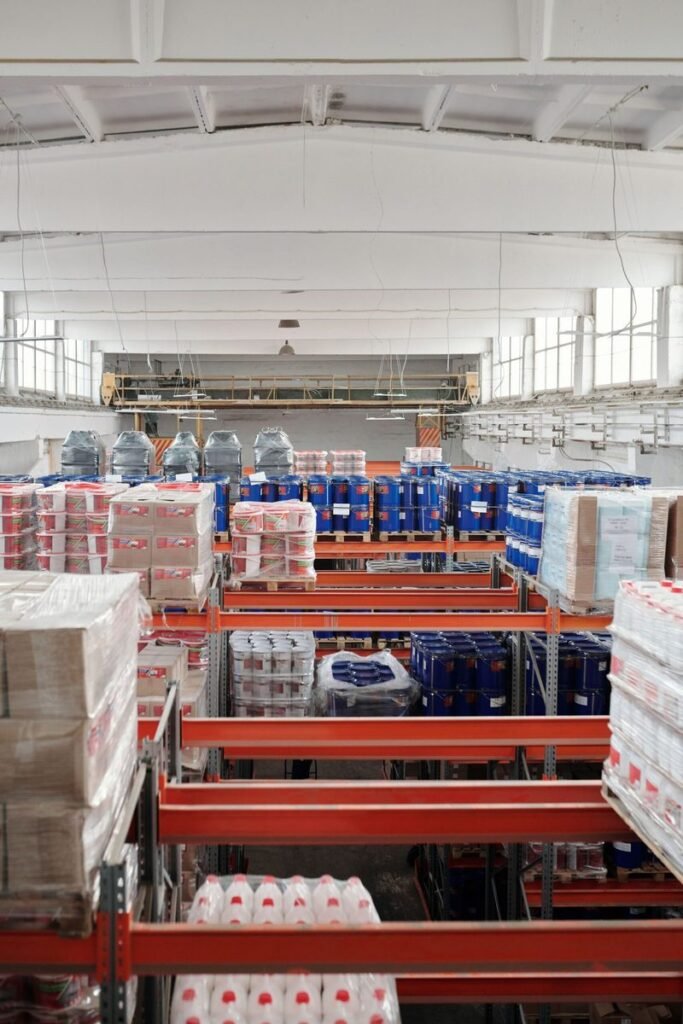 Cargo containers being loaded onto a truck for freight forwarding in Dubai